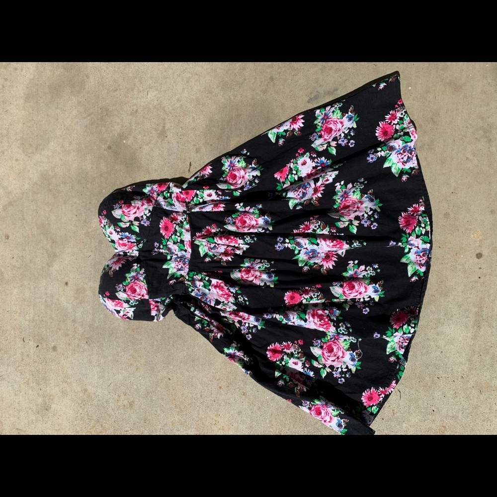 Black with flowers no strap mini dress.